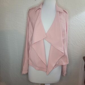 Torrid size double zero (equivalent to a size 14) pink Blazer.